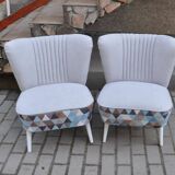 Set of 2 vintage multicoloured cocktail chairs in fabric and wood from the 1950s.