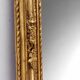 Miroir baroque doré avec guirlande de fleurs