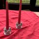 Two vintage white porcelain flower candle holders