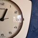 Vintage formica silent wall clock trapeze "Pale yellow Talgo"
