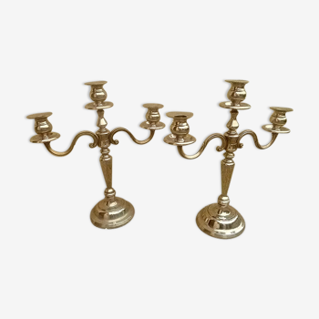 Pair of silver-colored metal candlesticks