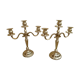 Pair of silver-colored metal candlesticks