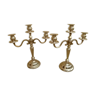 Pair of silver-colored metal candlesticks