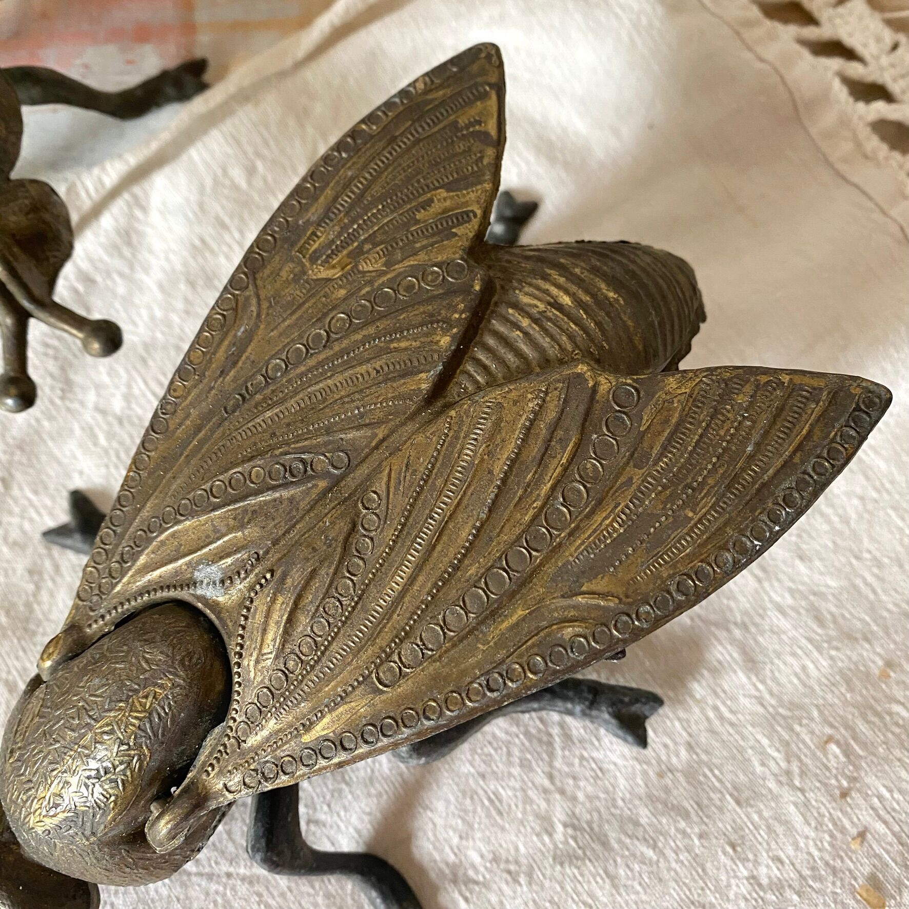 2 metal ashtrays with insect fly designs from the 1950s-60s.