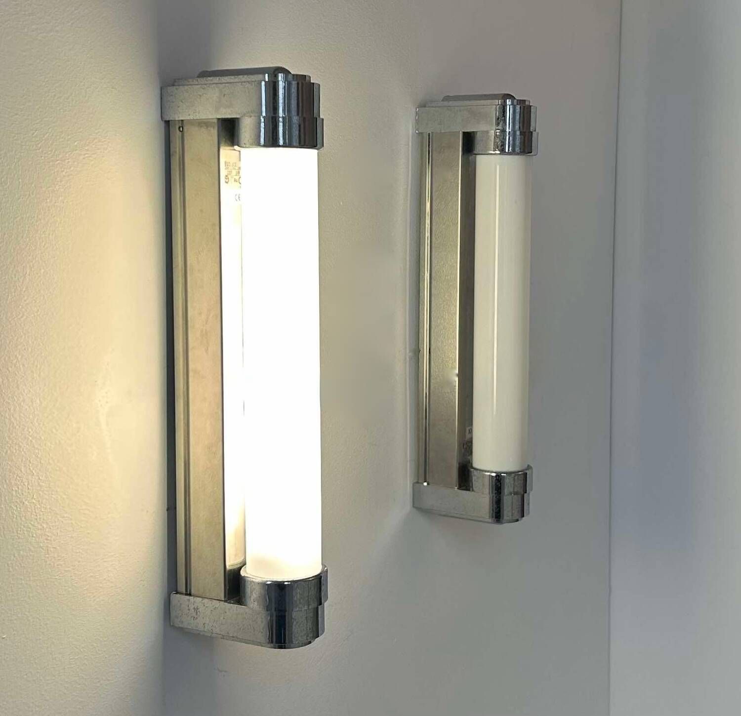 Pair of vintage wall lights, chromed metal, Italy 1970