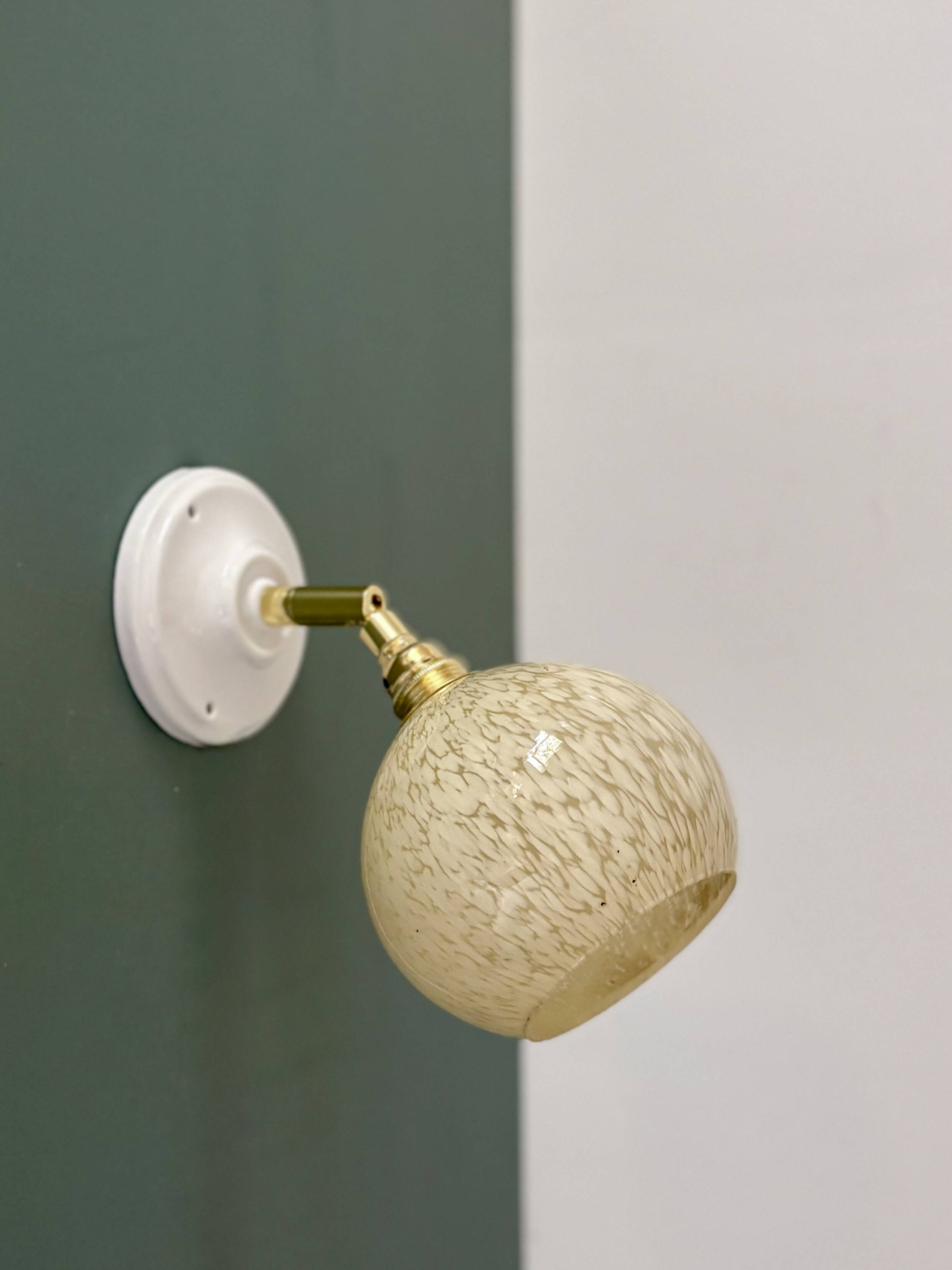 Vintage glass globe wall light in pale yellow from Clichy.
