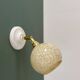 Vintage glass globe wall light in pale yellow from Clichy.