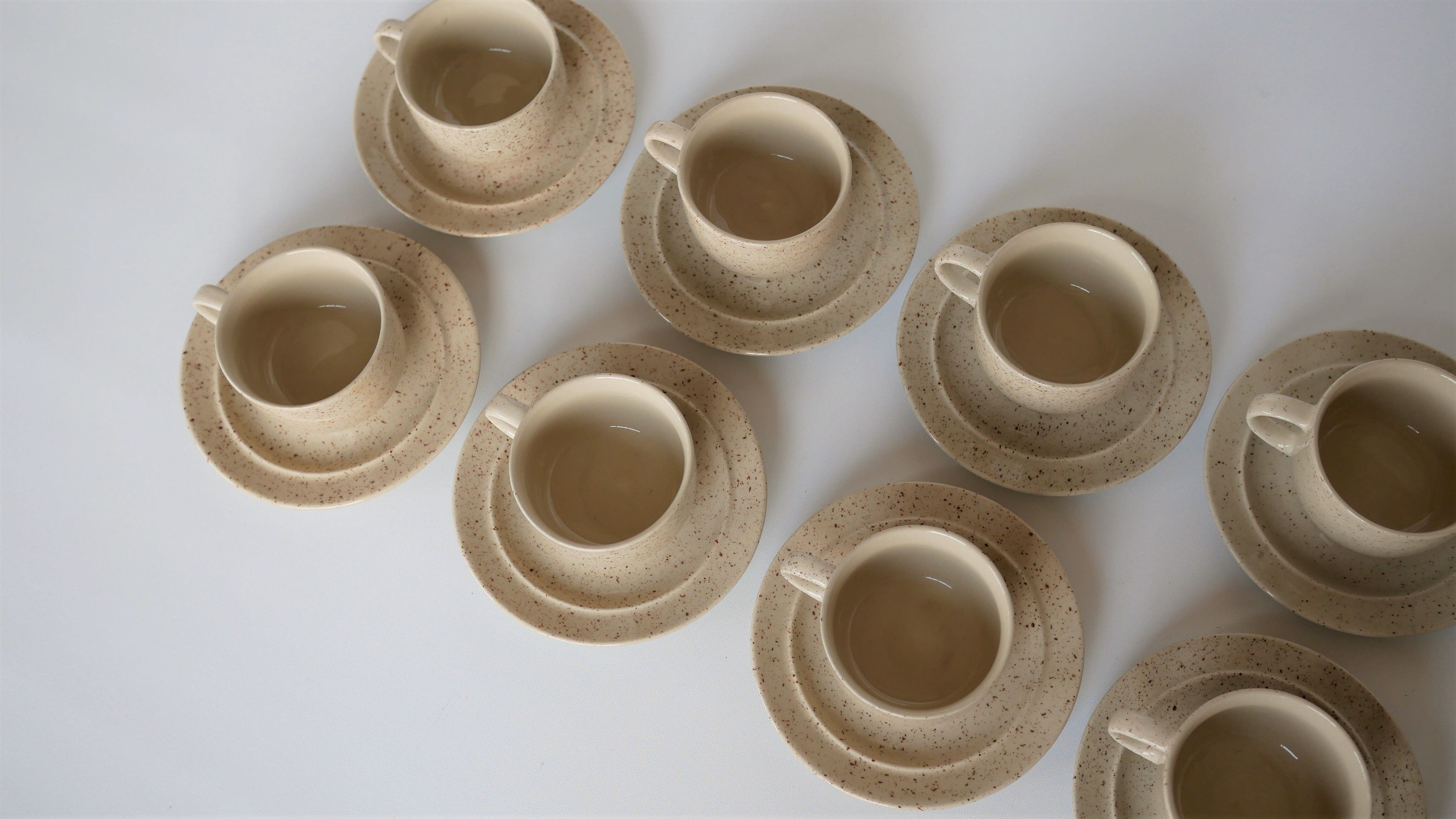 Coffee cup and vintage pyrity sandstone subcup