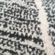 Genuine black and white Béni Ouarain Berber wool rug