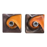 Pair of square ceramic wall sconces.