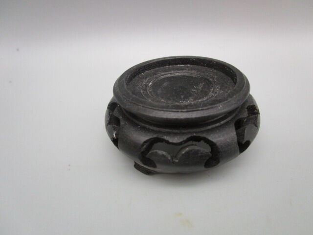 Ostrich egg on pedestal