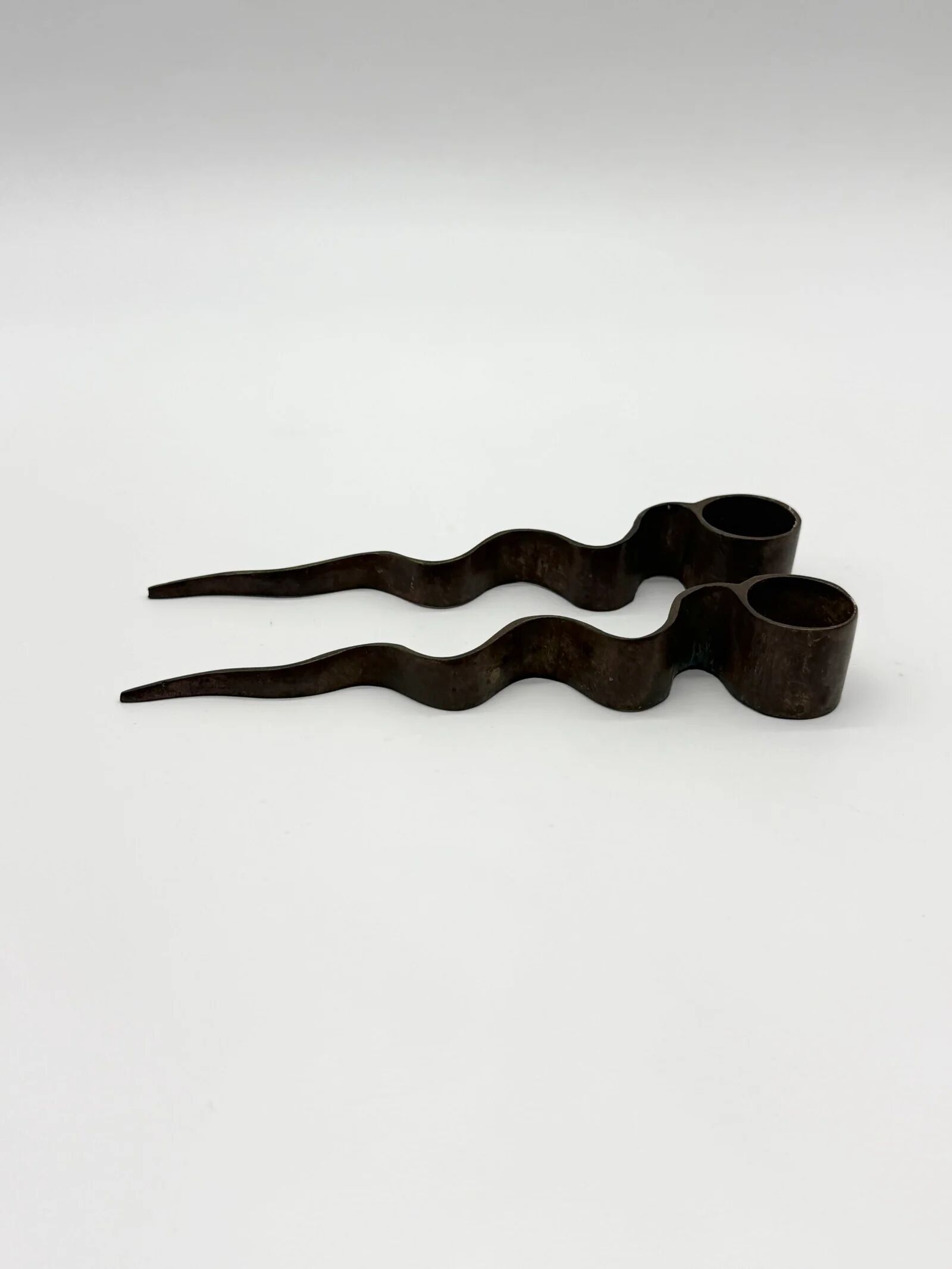 Pair of "Serpentine" candlesticks, modernist, 1970s