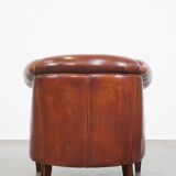 English style sheepskin club chair with a beautiful patina