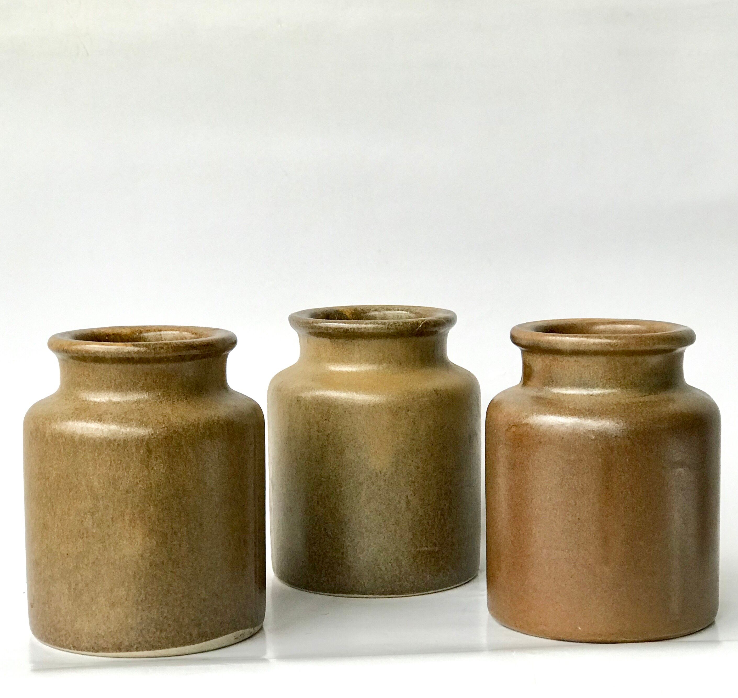 Set of 3 varnished sandstone pots