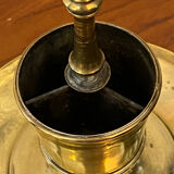 Compartmentalised brass candlestick