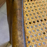 Antique wooden chair, cane seat