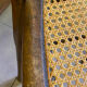 Antique wooden chair, cane seat