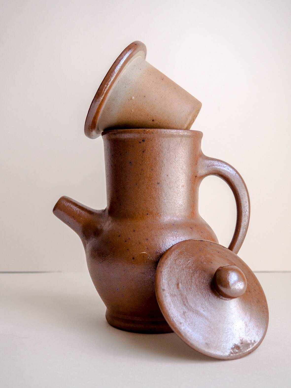 Handcrafted stoneware teapot with strainer