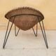Fauteuil vintage en rotin pieds métal