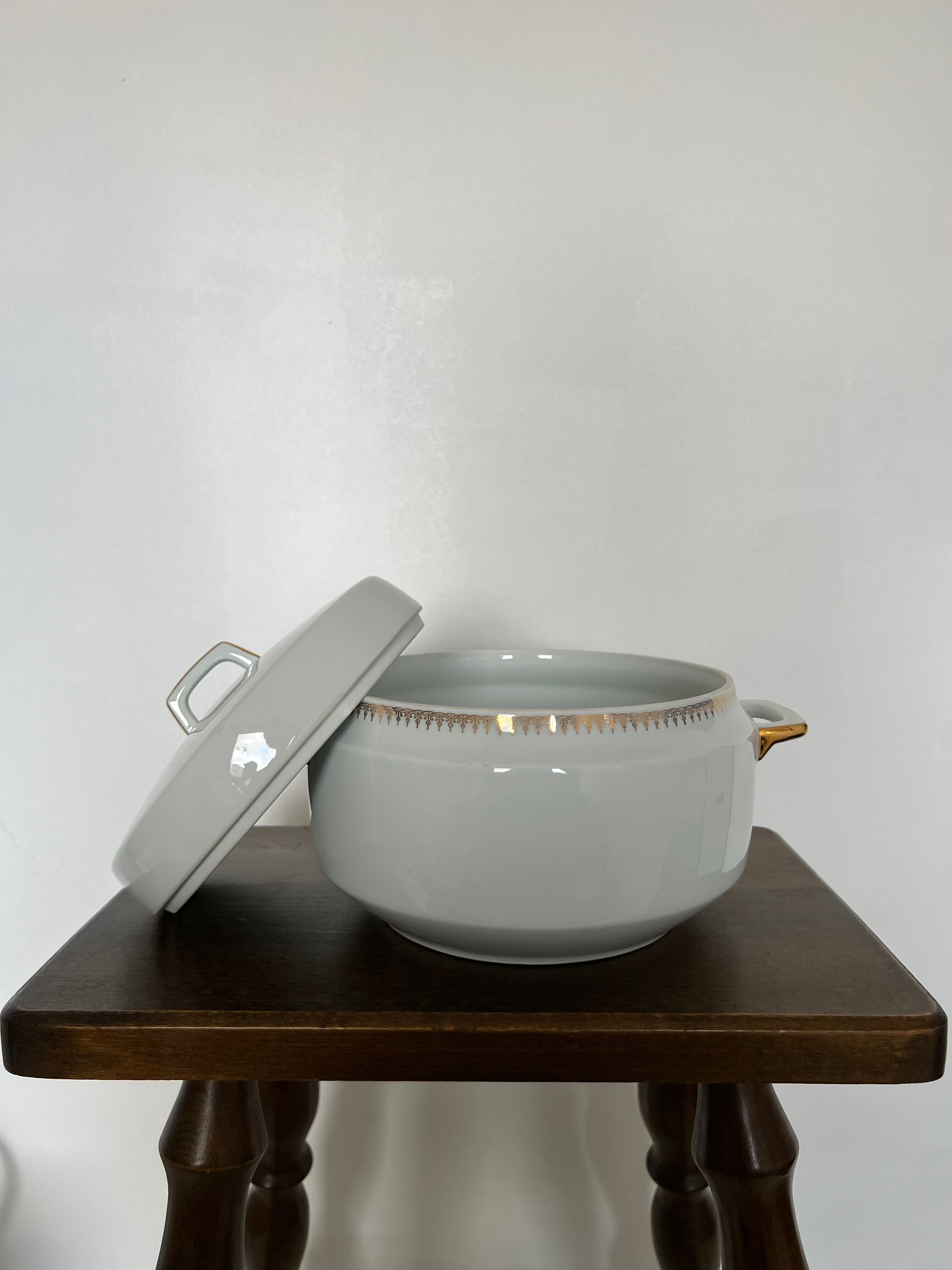 Large white tureen with gold edges art deco style