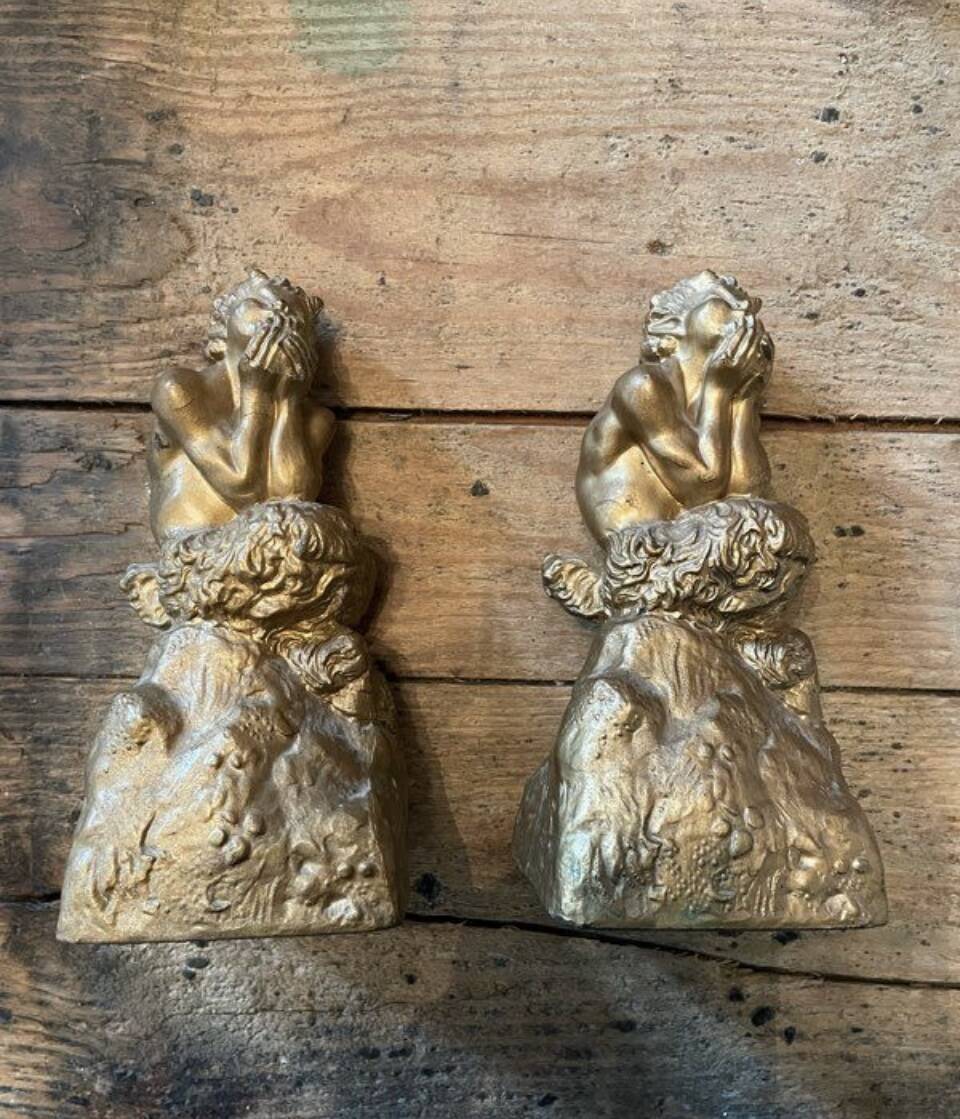 2 Seated satyr sculptures in cast bronze