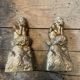 2 Seated satyr sculptures in cast bronze