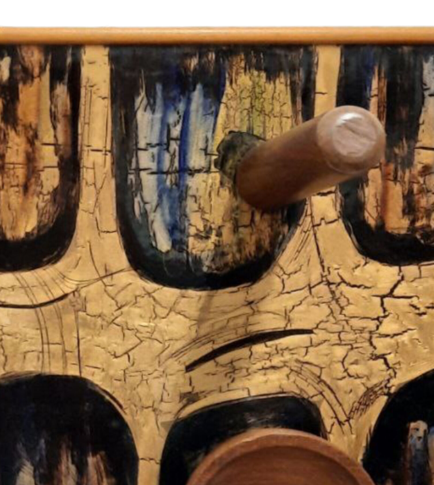 Vintage wooden coat hangers and glazed copper