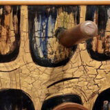 Vintage wooden coat hangers and glazed copper