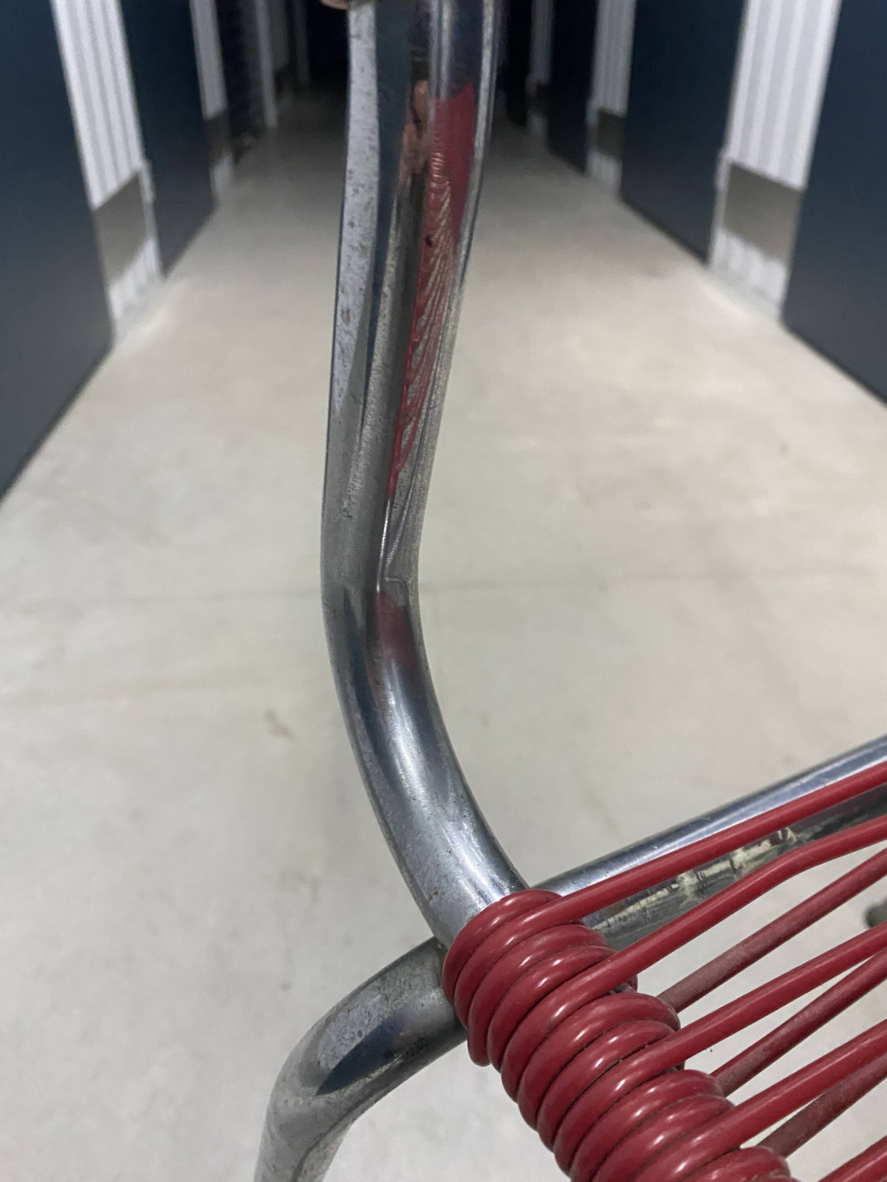 Red scoubidou chair from the 1960s.