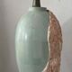 Vintage lamp base in Mactan stone and green marble.