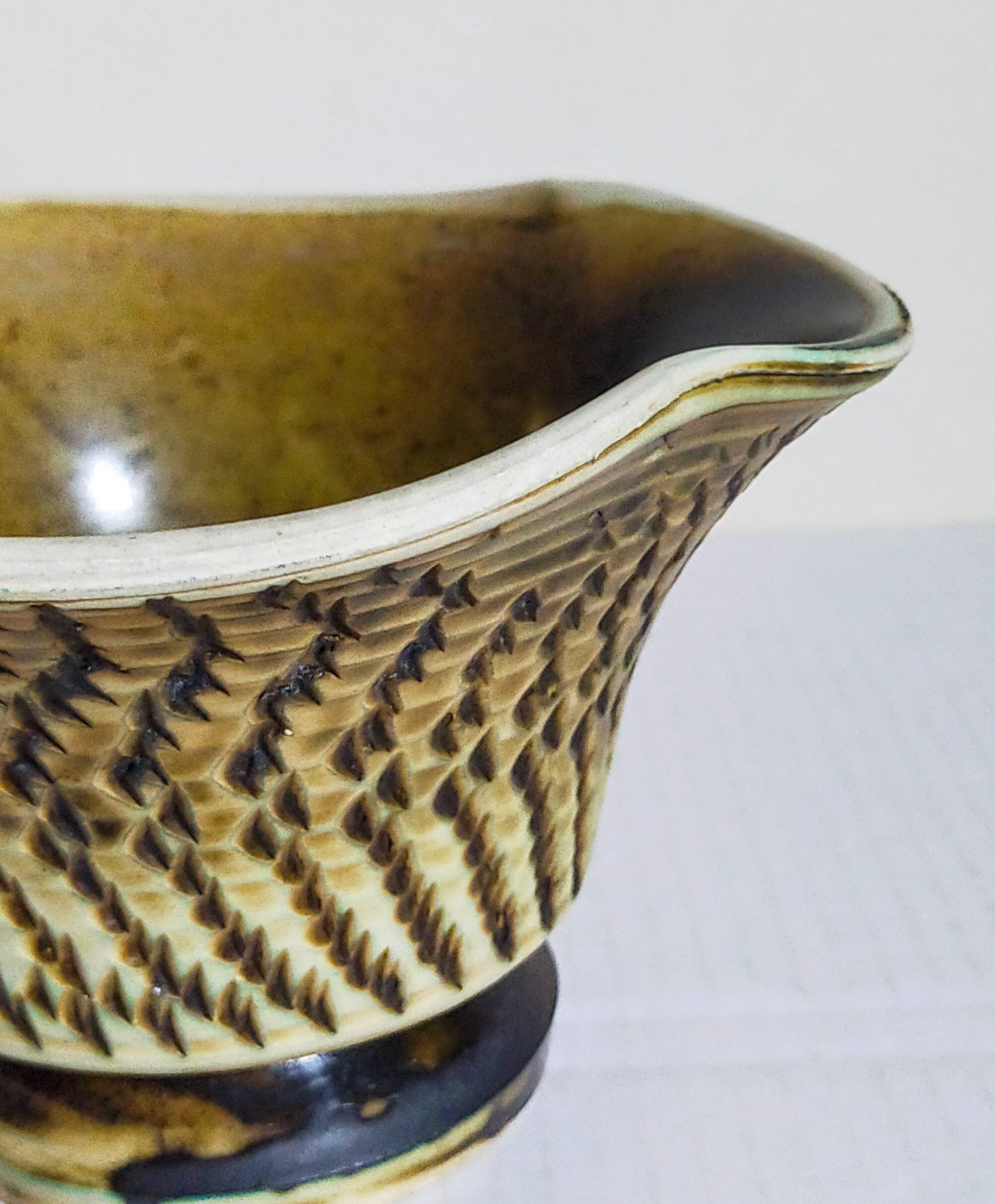 Ceramic planter with vintage scarifications from the 1950s
