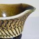 Ceramic planter with vintage scarifications from the 1950s