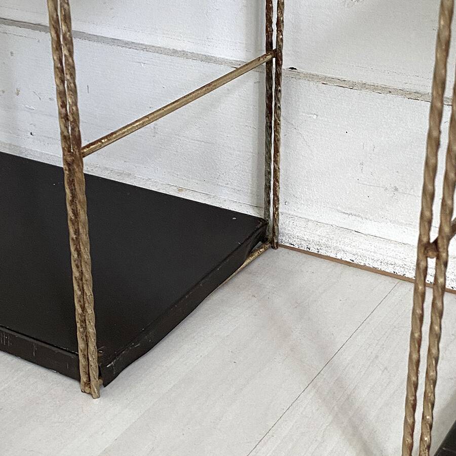 Pair of twisted string wall shelves