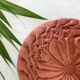 Coussin rond en velours orange