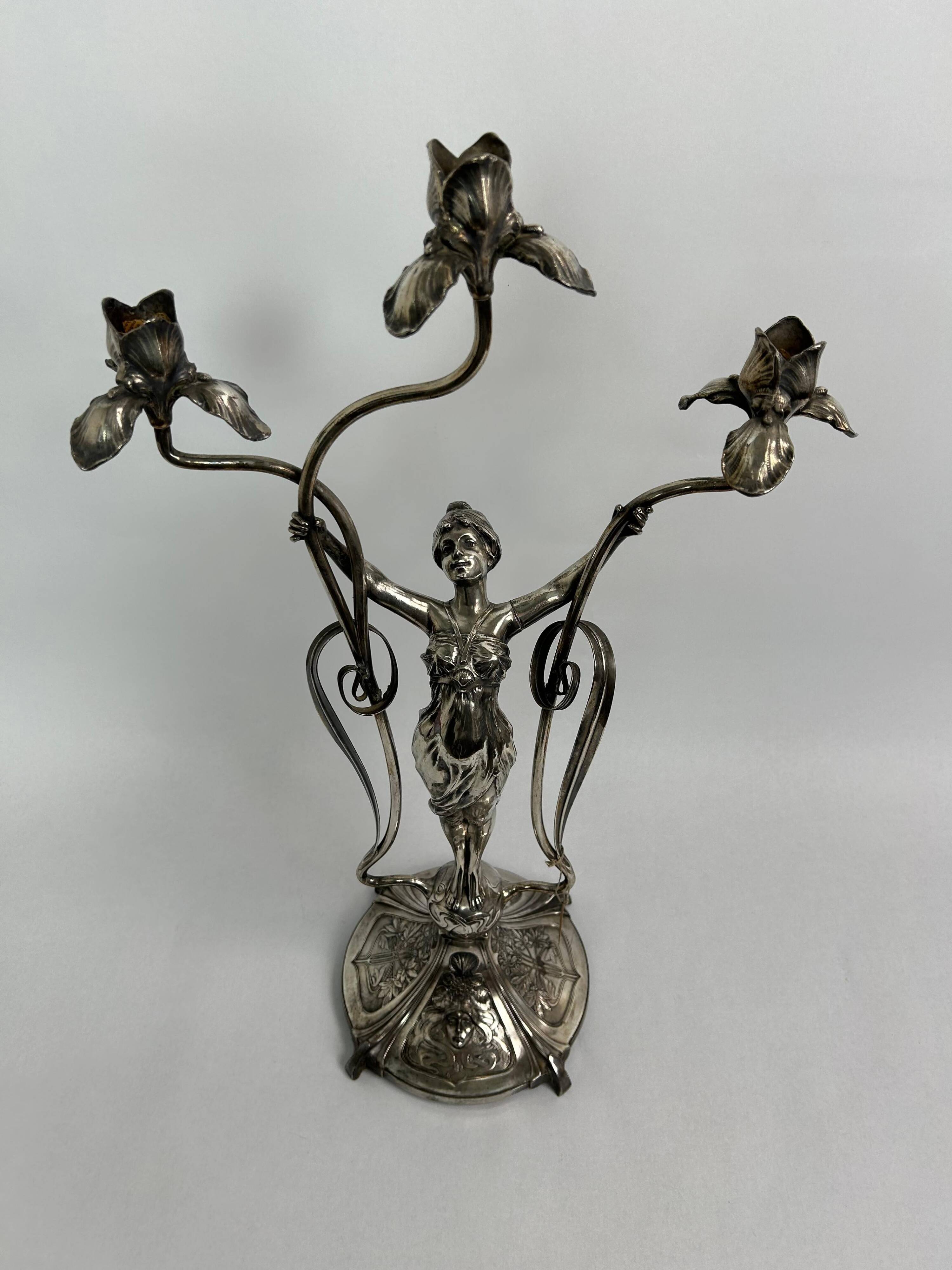 Large figurative chandelier with a femme fatale nymph.