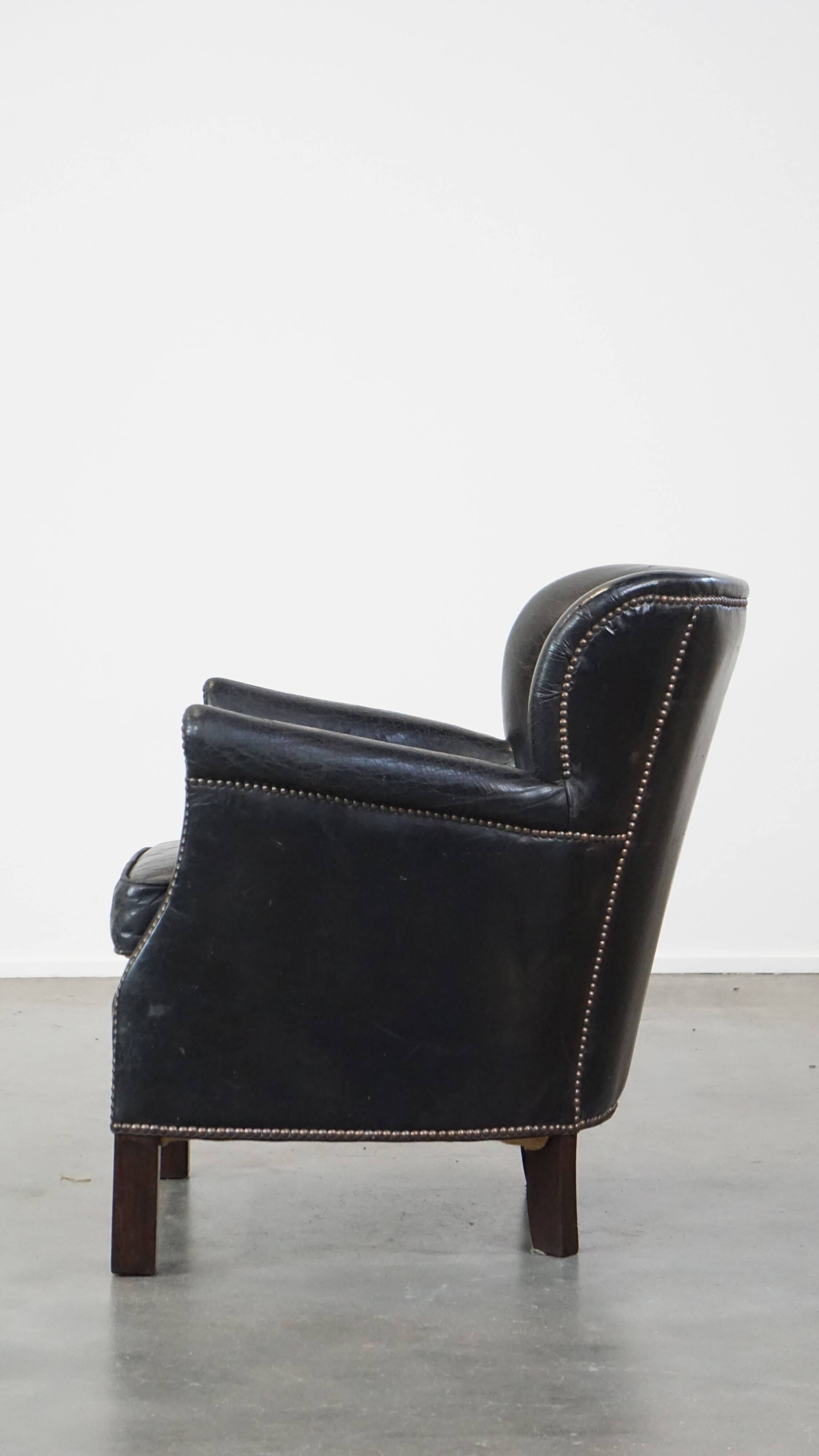 Fauteuil en cuir de vachette noir