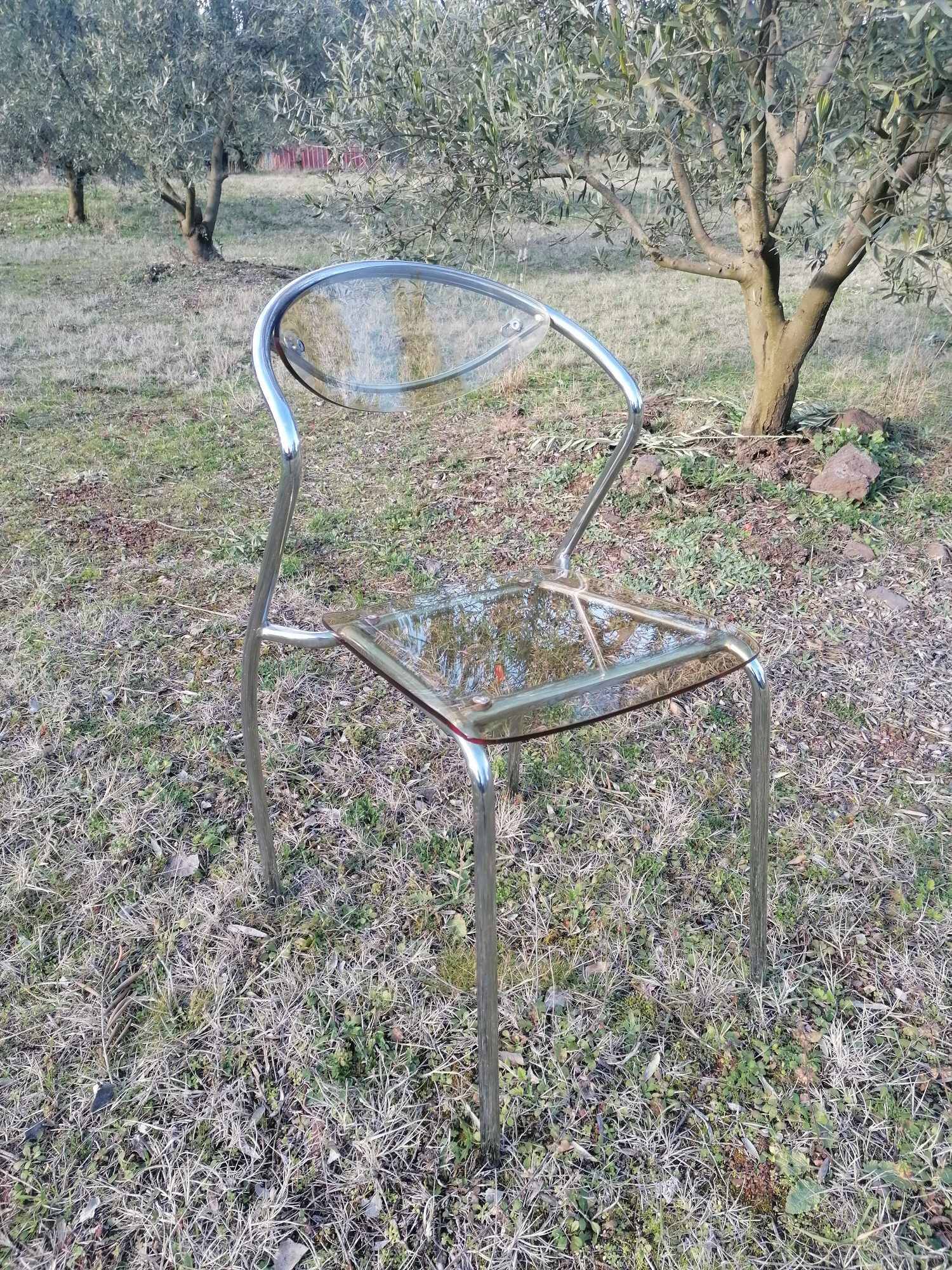 Vintage designer chair in plexiglass and chrome 1980