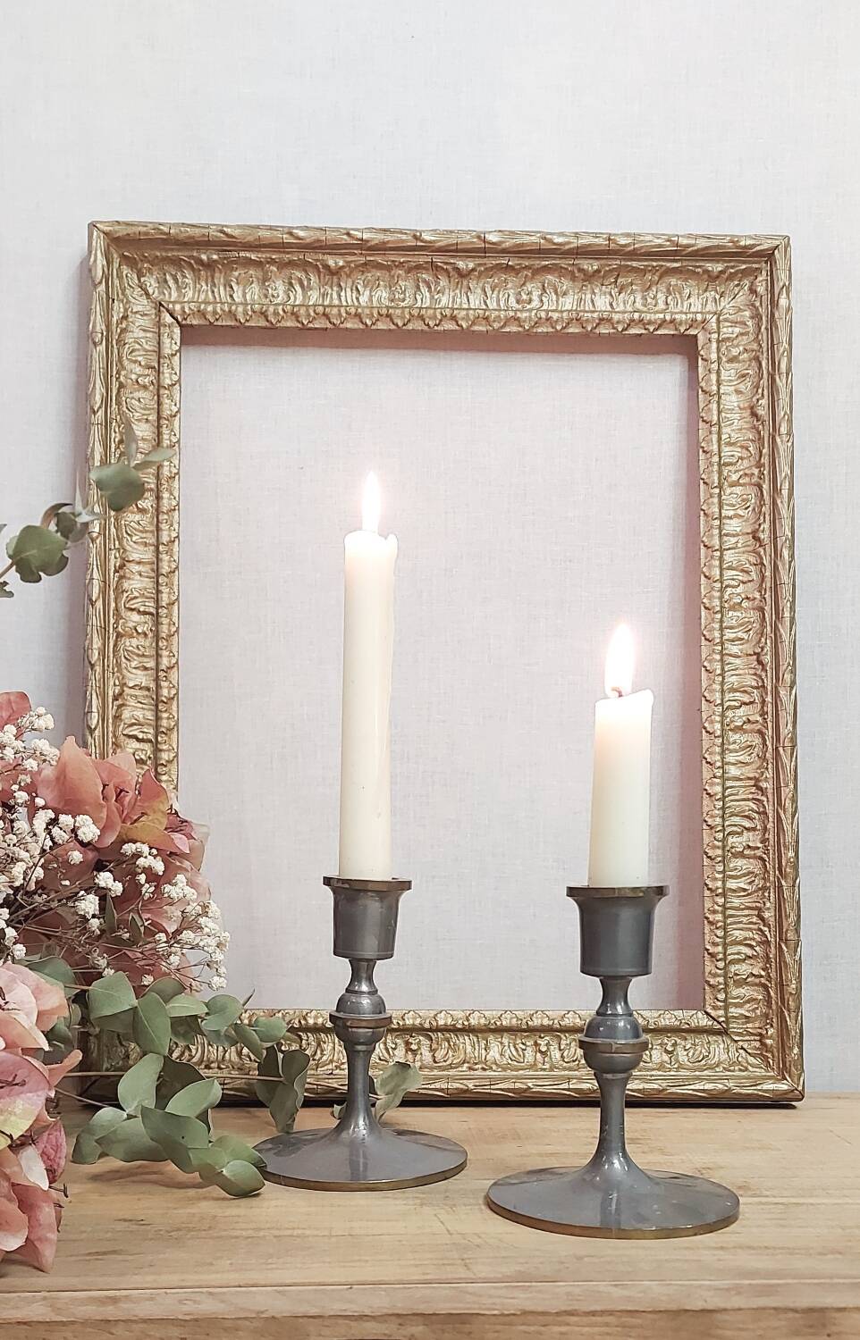 Pair of pewter candle holders