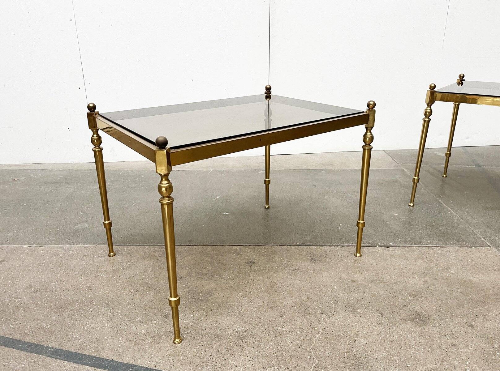 Mid-century Hollywood neoclassical brass and glass side tables or bedside tables from the 1950s, set of 2.