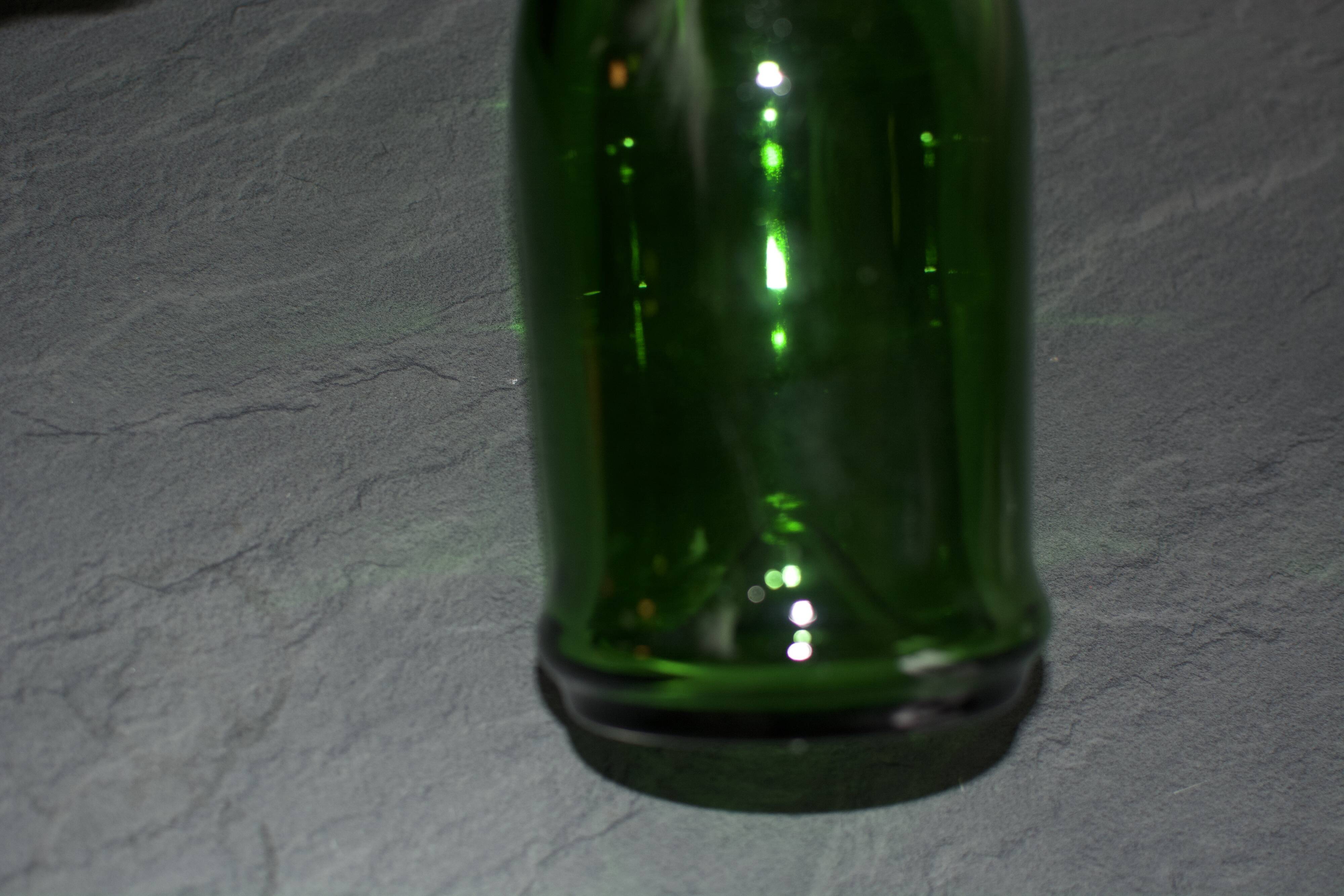 Vintage green glass bottle