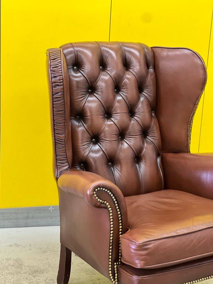 Fauteuil Chesterfield traditionnel anglais en cuir