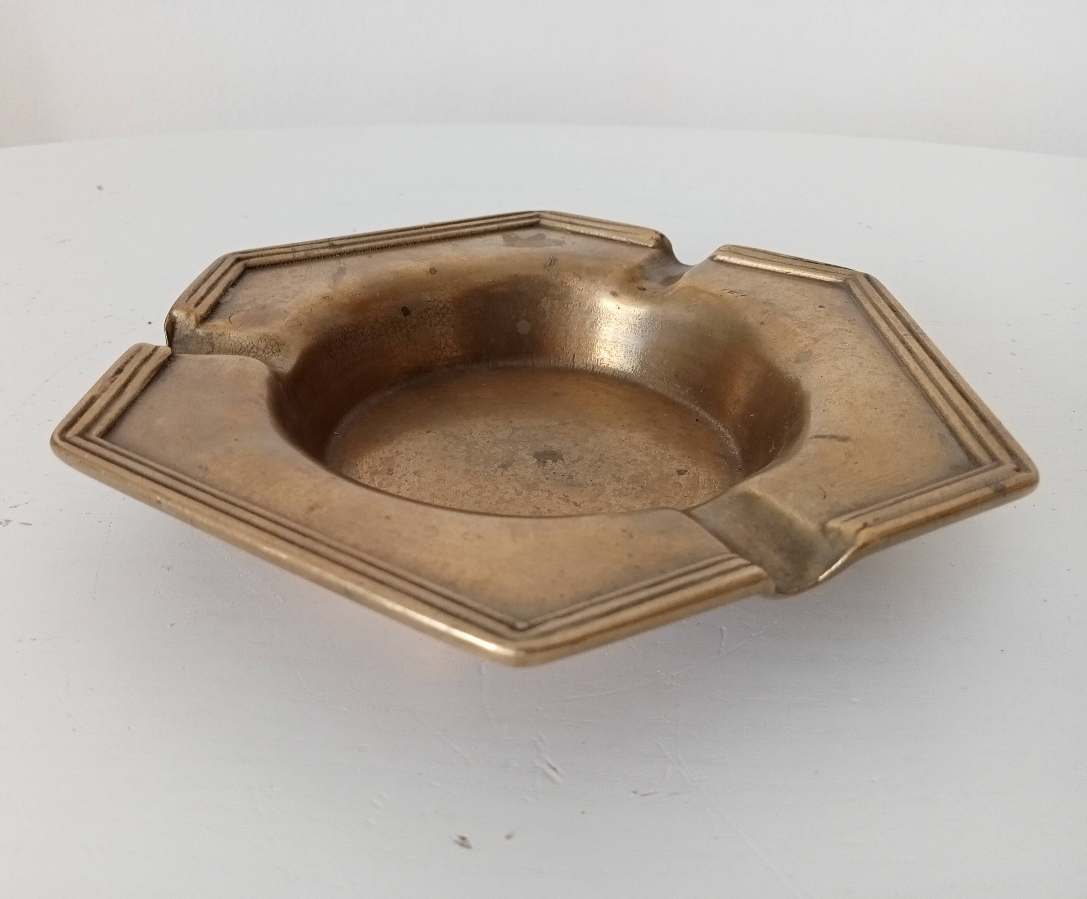Antique ashtray in solid gilded brass
