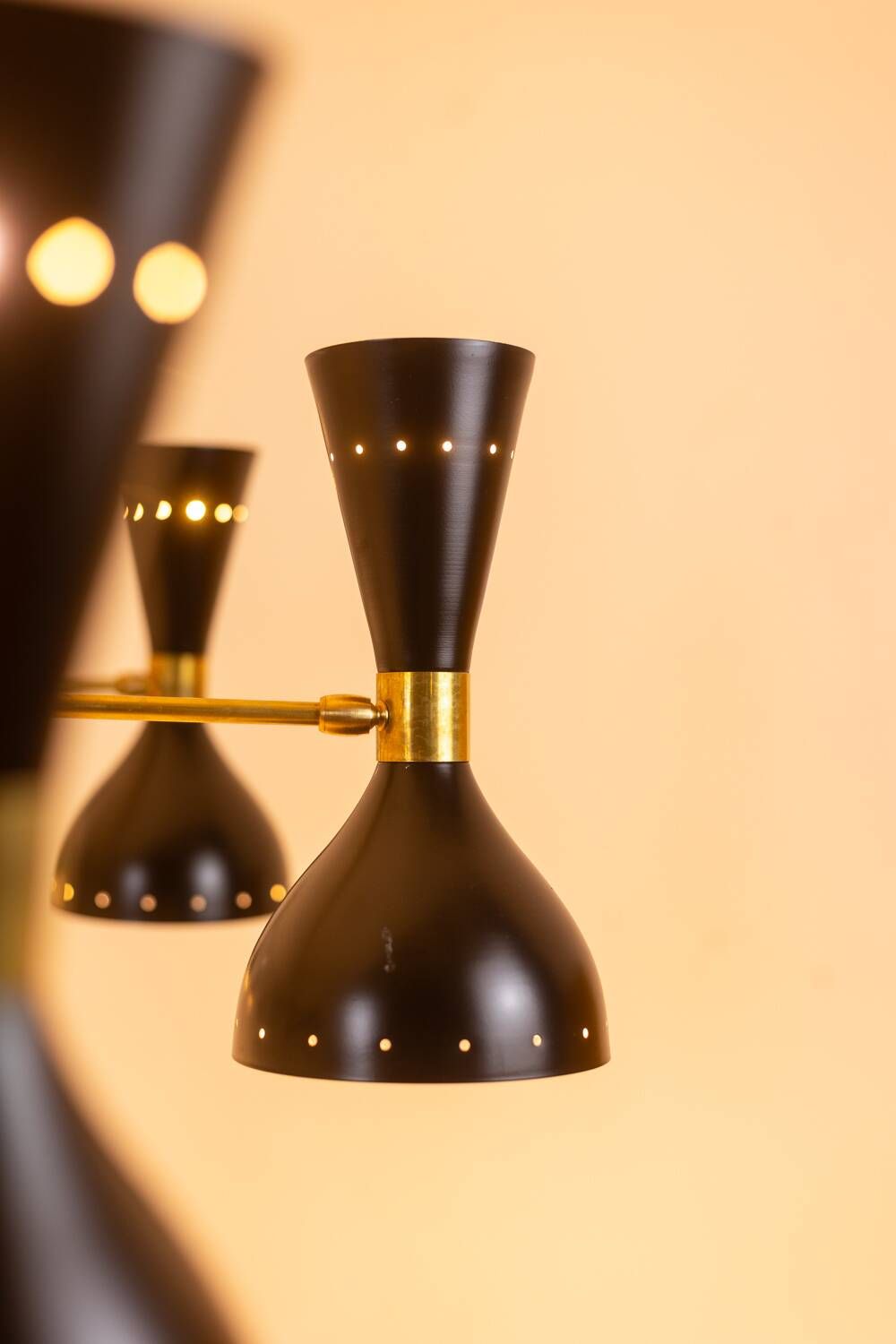 Black lacquered metal 12-arm light chandelier. Contemporary.