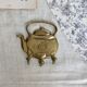 Vintage teapot-shaped brass coat hook