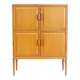 Large Swedish mahogany storage unit with four front doors.
