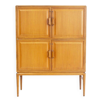 Large Swedish mahogany storage unit with four front doors.