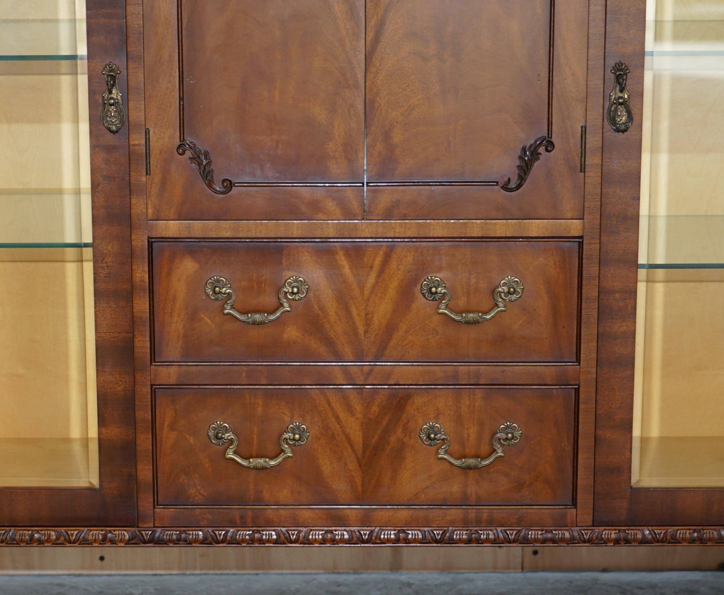 Vintage buffet display cabinet circa 1940 in flame mahogany and satinwood.