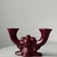 Pair of 1950s burgundy earthenware candlesticks