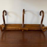 Wooden coat rack turned upside down