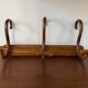 Wooden coat rack turned upside down